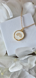 Gold and white enamel rainbow pendant necklace, minimalist hope jewelry by Caramel Sky Co.